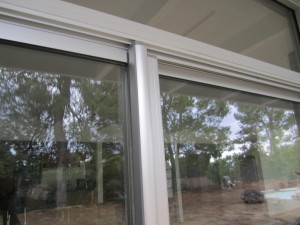 Clear Anodized Retractable Screen Door for a patio sliding screen door