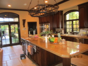 Arched window panels installed in kitchen