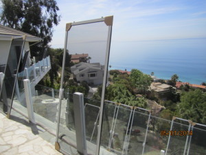 White Extruded Aluminum Sliding Patio Screen Doors Fabricated Custom Made and ready to be installed in Malibu Oceanview Home