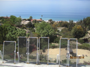 White Extruded Aluminum Sliding Patio Screen Doors Fabricated Custom Made and ready to be installed in Malibu Oceanview Home