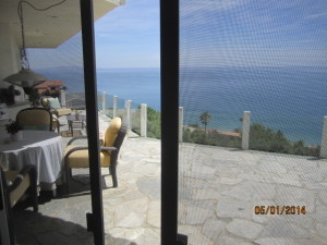 View from Living Room of Sliding Patio Screen Doors installed in Malibu Oceanview Home