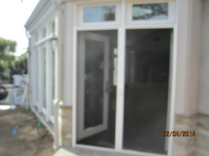 Interior View of Double Set of Retractable Screen Doors in Encino