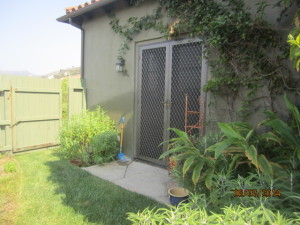 View after installation of custom made heavy duty Senry 4900 security screen doors on double french doors in Topanga