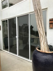 White Double Set Sliding Screen Doors with Meeting Rail