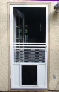 Pet Door on a White Colonial Swinging Screen Door